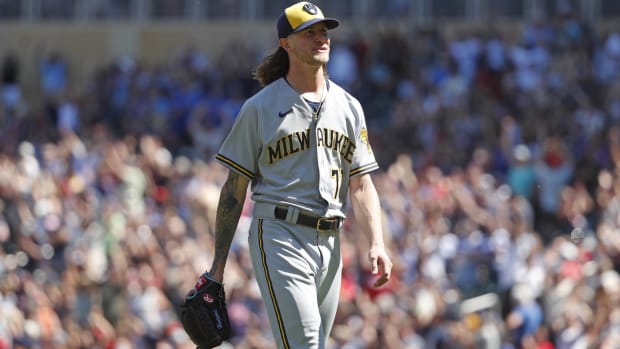 Brewers closer Josh Hader walks off the field after giving up a walk-off home run to the Twins.